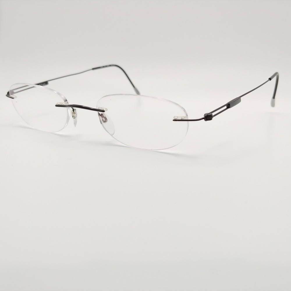 Silhouette Eyeglasses 50-19-145 Brown Titanium Rimless Oval 7534 6082 50